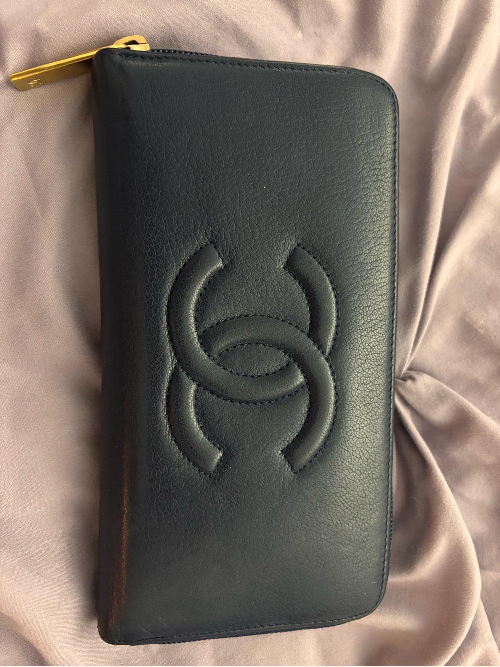 CHANEL Navy Quilted Zip-Around Leather Wallet with Embossed Interlocking Motif